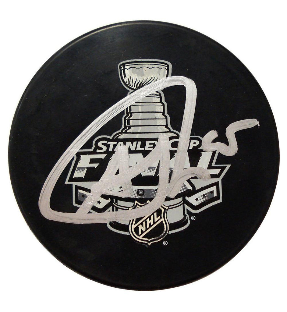 Autographed Andrew Shaw 2013 Stanley Cup puck.