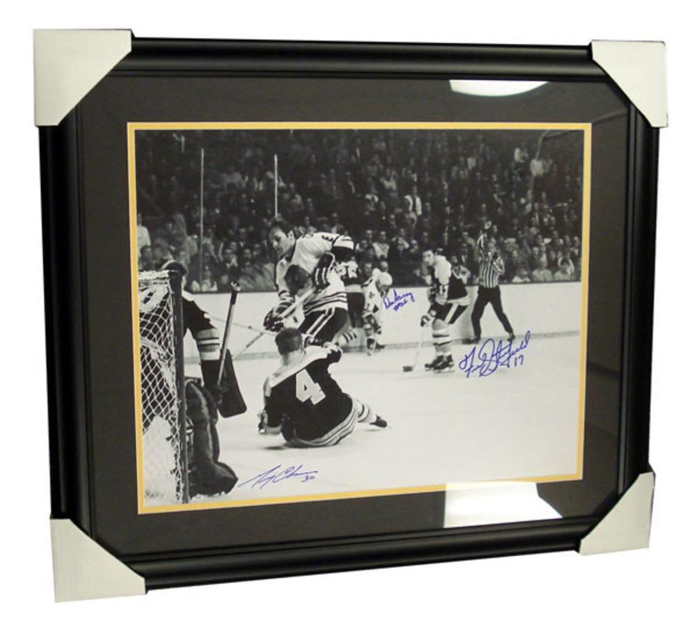 Autographed Gerry Cheevers Don Awrey and Fred Stanfield framed 16x20 photo.