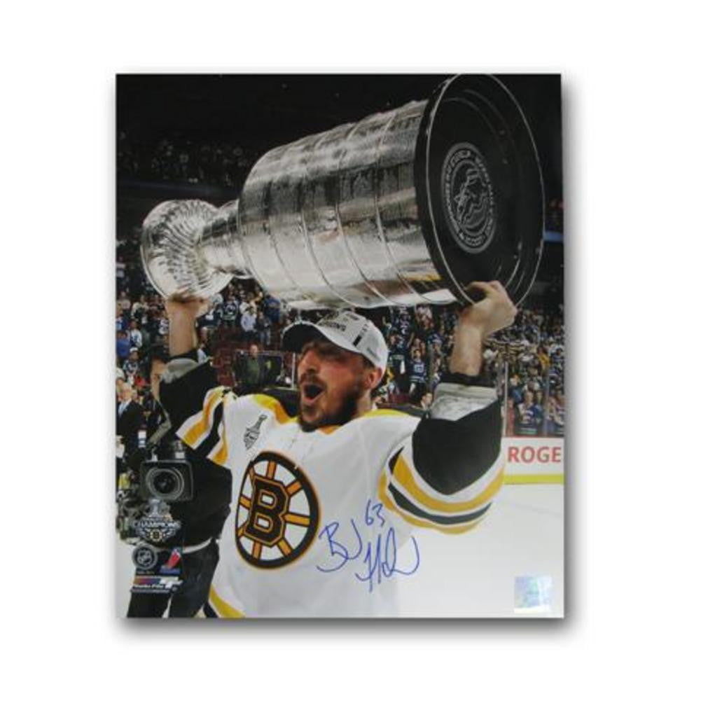 Autographed Brad Marchand 16-by-20 inch unframed Boston Bruins photo.