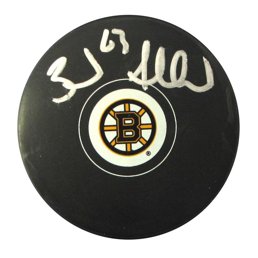 Autographed Brad Marchand Boston Bruins puck.