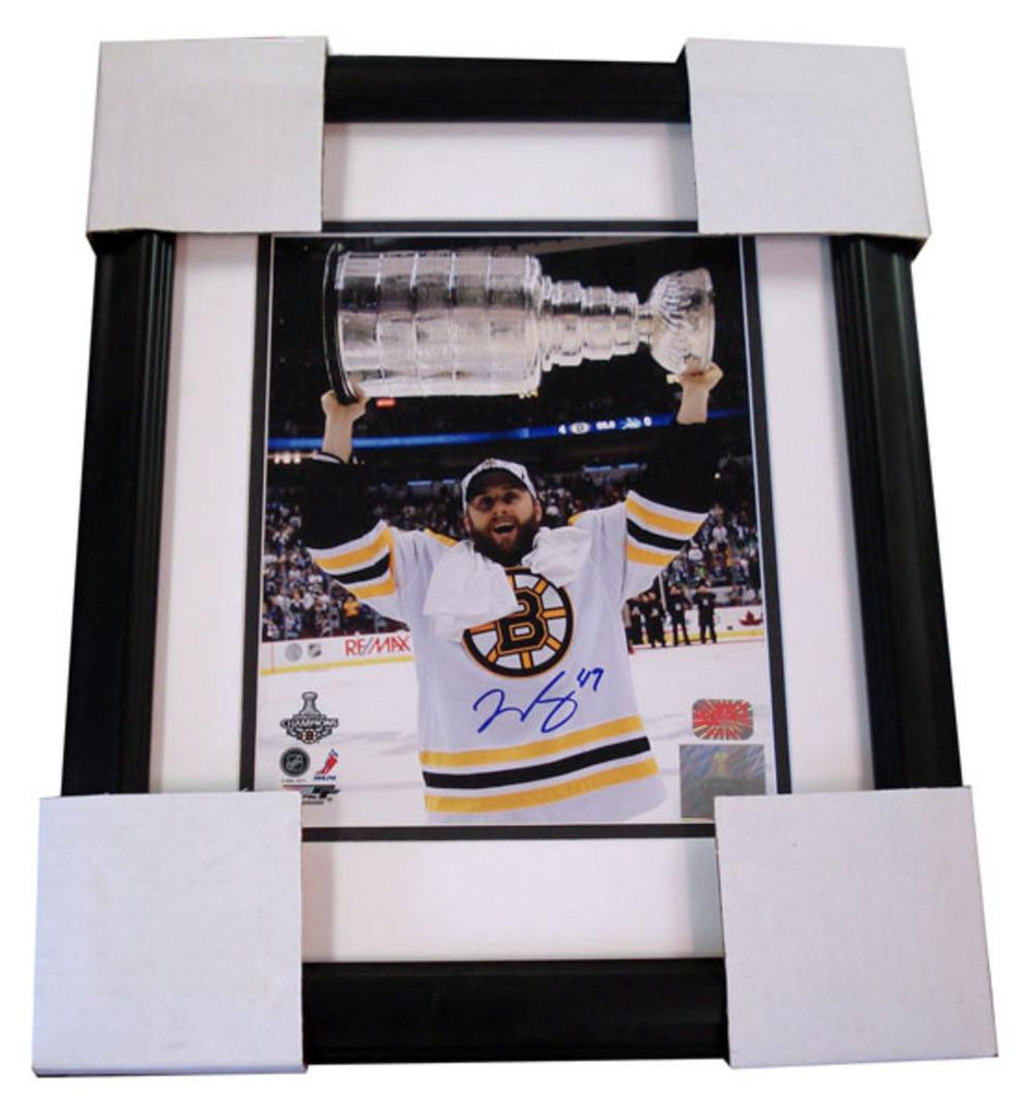 Autographed Rich Peverley 8x10 framed 2011 Stanley Cup overhead photo.