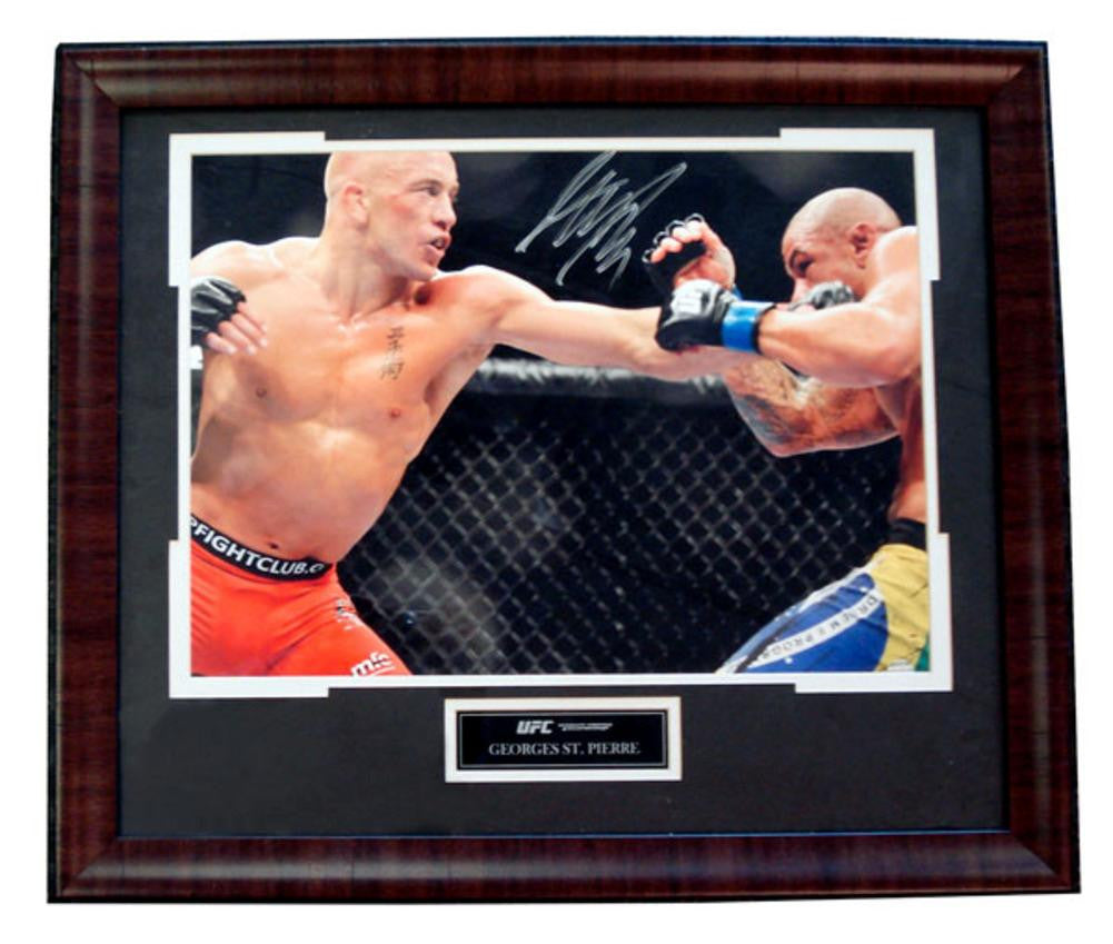 Autographed George St. Pierre 16x20 framed photo of the UFC fighting Thiago Alves on July 11 2009