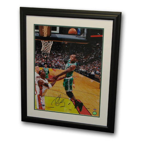 Autographed Rajon Rondo 16x20 framed photo.The photo is of Rondo in Game 2 of the Eastern Conference Finals dunking against the Miami Heat.