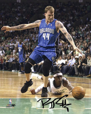 Autographed Rajon Rondo 8-By-10 Inch Unframed Photo (Coa: Sports Images)